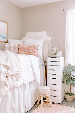 A lofted bed calls for more material to hide everything youve stored below. Dawn Thomas says the combination of a bed...