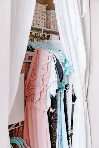 Many dorms have open closets so similar to using a skirt to hide the storage under your bed curtains will neatly conceal...